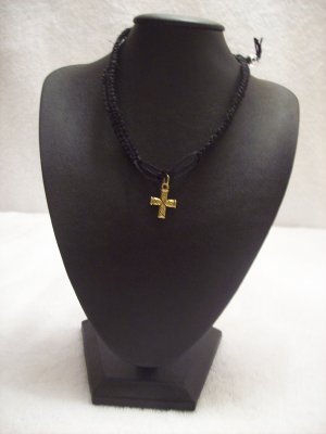Gold cross on black square/open square