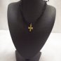 Gold cross on black square/open square