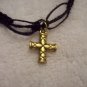Gold cross on black square/open square