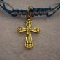 Gold cross on blue and turquoise square/switchback