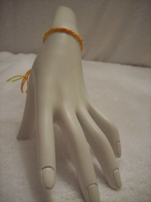 Yellow and orange braided wrap
