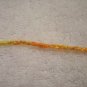 Yellow and orange braided wrap