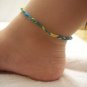 Blue, green, and yellow braided wrap