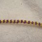 Yellow and purple knotted