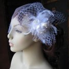 White feather fascinator