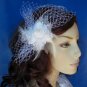 White feather fascinator