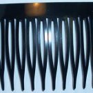 Black plastic sidecomb