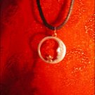 SILVER-TONED CRESECENT MOON & STAR OPEN CHARM ON CORD