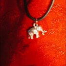 SILVER-TONED WOOLY MAMMOTH CHARM ON CORD
