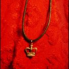 SILVER-TONED CROWN CHARM ON CORD