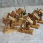 6 Olive Wood Nativity Tree Ornaments with Star Background