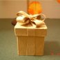 SET OF THREE PAPER MACHE NESTING GIFT BOXES WITH BOWS