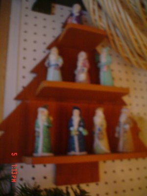 Tree Shelf with Eight Different Santas