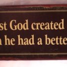 First God created man, then He had a better idea TIN SIGN