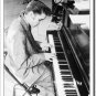 Elvis Presley playing piano - Wertheimer Collection 1956 TIN SIGN