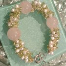 Multi gemstones and freshwater cultured white pearls in sterling sliver bracelet. 9’’
