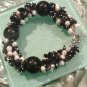 Multi gemstones and freshwater cultured white pearls in sterling sliver bracelet. 9’’