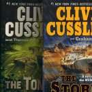 Lot of 2 Clive Cussler The Storm and The Tombs Hardcover