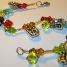 Glass and totem head necklace