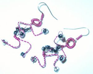 Pink adjustable figure earrings