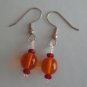 Large Orange Balls with tiny Red Beads