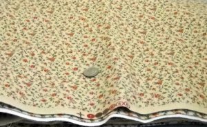 2 yds print fabric lt tan background with small rose red flowers with green stems and leaves