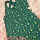 The green dotted vest