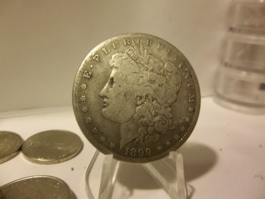 1899-O #4 90% Silver Morgan Dollar.