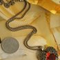 Winged red heart pendant