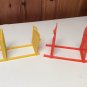2 Plastic Xerox Castle & Weekly Reader Book Club Holder Rack Book Ends CHILDRENS