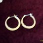 silver hoops pierced