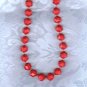 PRICES SLASHED-RED FACETED EARLY PLASTIC VNTG SINGLE STRAND NECKLACE