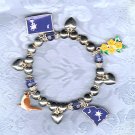 PRICES SLASHED-UNSIGNED BEAUTY ASSORTED CHARM BRACELET STRETCHY