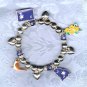 PRICES SLASHED-UNSIGNED BEAUTY ASSORTED CHARM BRACELET STRETCHY