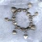 PRICES SLASHED-VINTAGE SILVERTONE HEART CHARM STRETCHY BRACELET