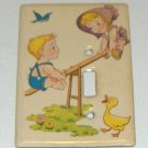 Vintage Metal Switchplate Cover - Young Boy & Girl on Seesaw with Duck, Bluebird