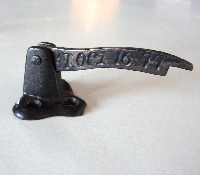 Antique Kickdown Door Stop