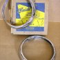 1948 Pontiac NOS fog lamp bezel pair