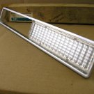 1974 Bonneville Catalian parking lamp bezel NOS right