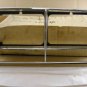 1982 1986 Pontiac Bonneville head lamp NOS bezel LH