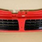 1988 1991 Pontiac Lemans NOS grille red P# 90263692
