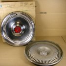 79 81 Pontiac Fullsize w/ deluxe cover NOS hubcap pair