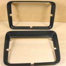 1979 81 Pontiac Firebird black head lamp bezel pair NEW