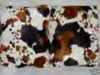 Two Cow (leather like) faux fur throw pillows