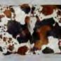 Two Cow (leather like) faux fur throw pillows