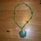 green and silver shell