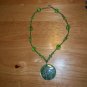 green and silver shell