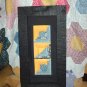 Blue and Yellow Log cabin quilt framed stitchery