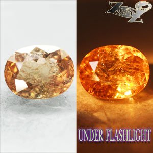 6.68 CT.BIG RARE FIRELY NATURAL OVAL COLOR SHIFT SALMON YELLOW FERRO AXINITE GEM