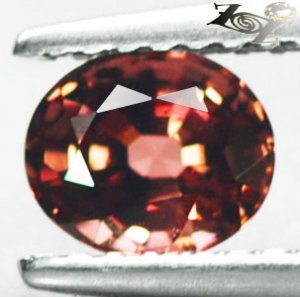 RARE CLR EYE CLEAN FULL FIRE NATURAL OVAL TOP PADPARADSCAH MALAYA GARNET 1.06 CT.